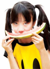 Teenager eating watermelon